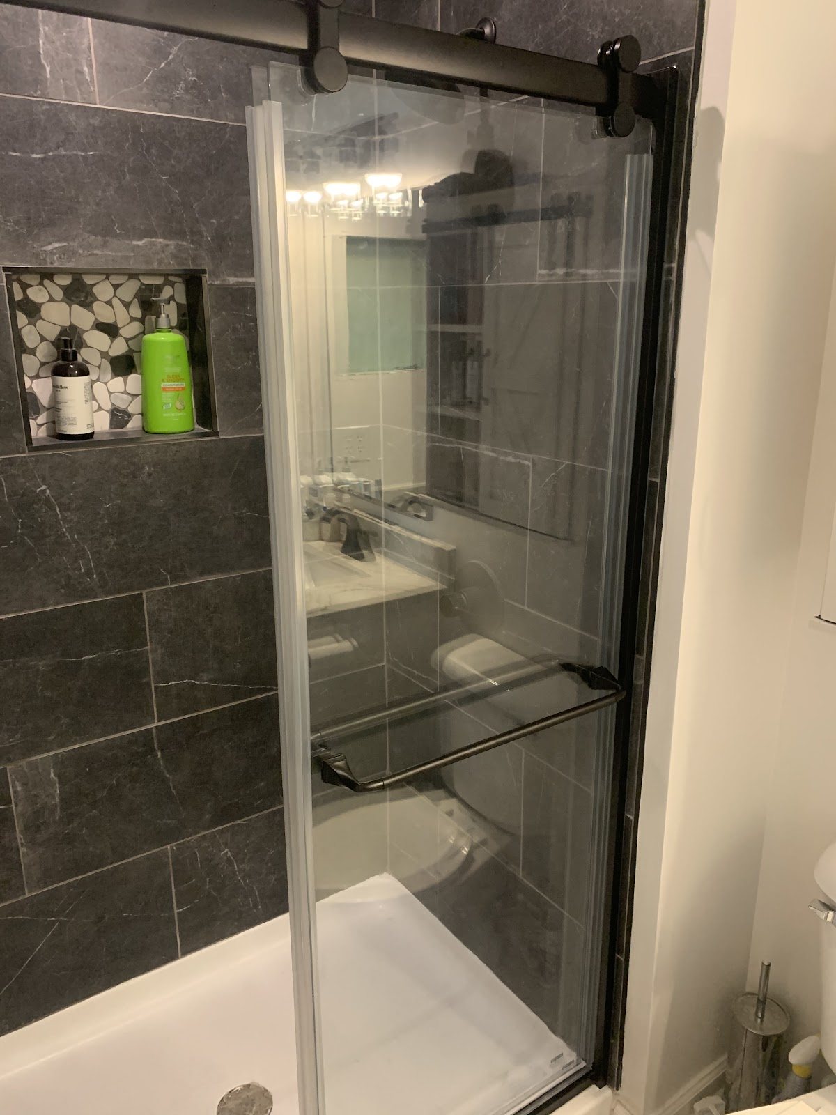 Glass tile shower enclosure